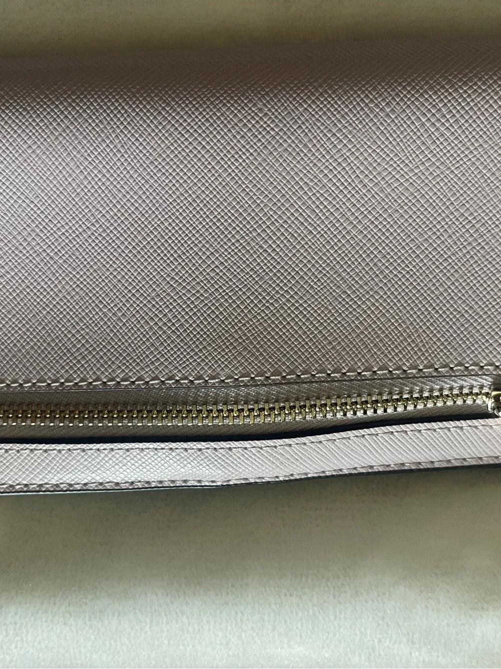 kate spade light pink saffiano leather wallet with gold logo